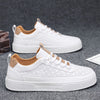Männliche freizeit sneakers mit stylischem lochdesign - schicke schnürschuhe für den alltag
