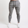 Männliche sportliche slim-fit jogginghosen - vielseitige sport-leggings für einen aktiven lebensstil