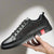 Männer sneaker im lässigen stil - vielseitiges schwarzes design für den alltag