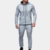 Männer trainingsanzug mit hoodie - elegant und vielseitig für den alltag